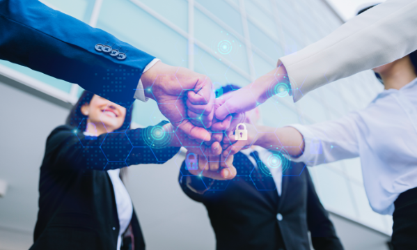 young-business-people-putting-their-hands-together